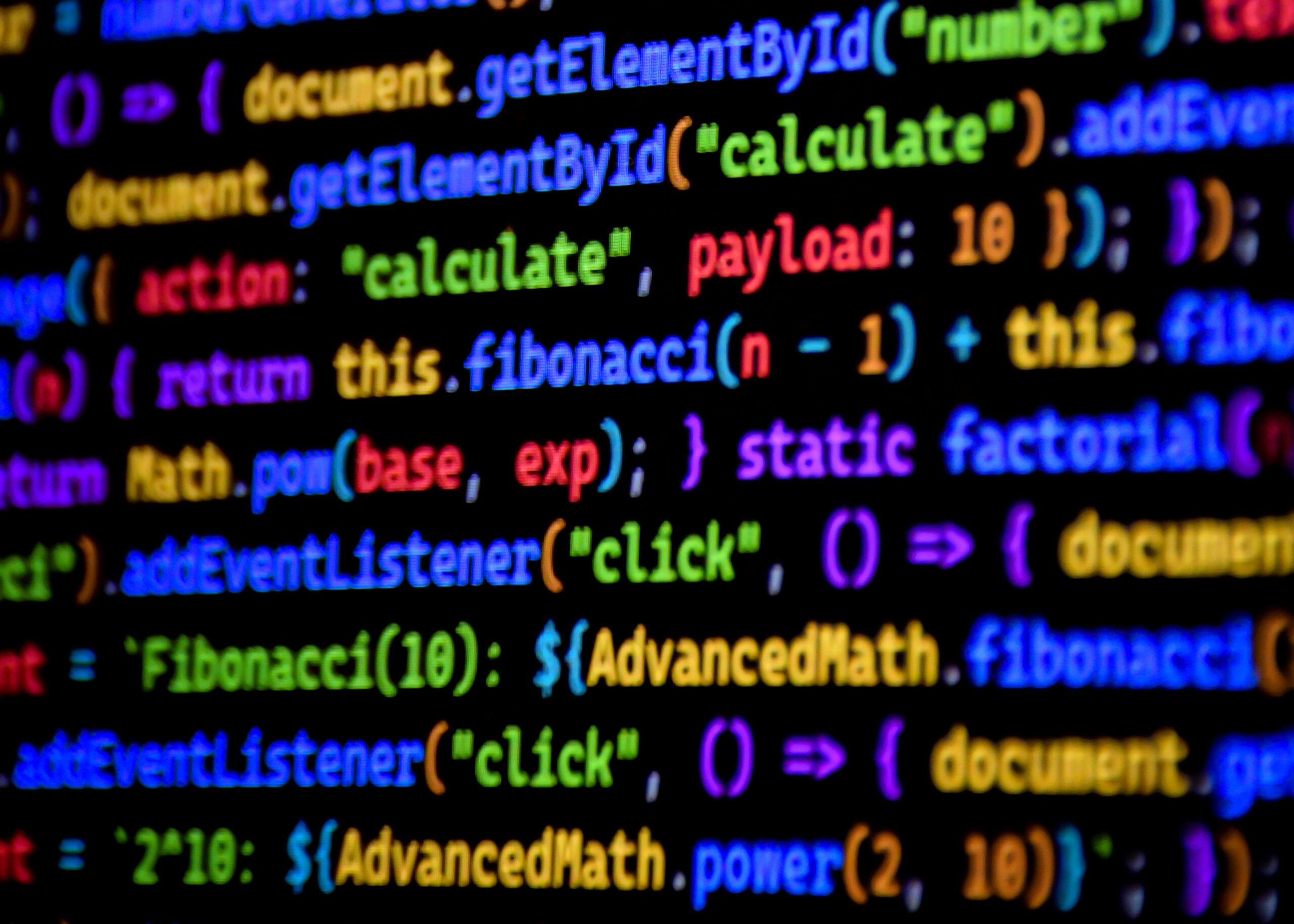 Heller und farbenfroher JavaScript-Code, der auf einem Computerbildschirm angezeigt wird und die Programmierung veranschaulicht.